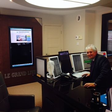 elderly office person at office with computers