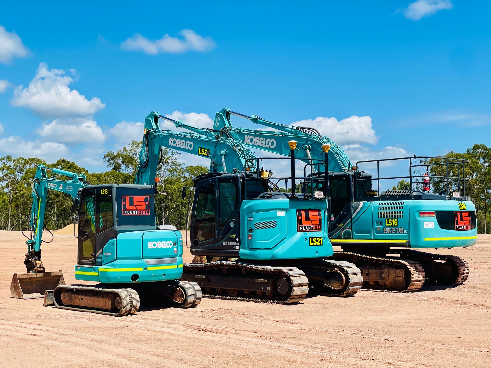Workers Pouring Concrete for a Pathway in a Wooded Area — LS Plant Hire in Calliope, QLD
