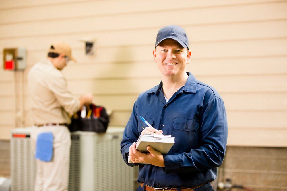 Smiling Technician — Langwarrin, VIC — Southside Plumbing Heating & Cooling