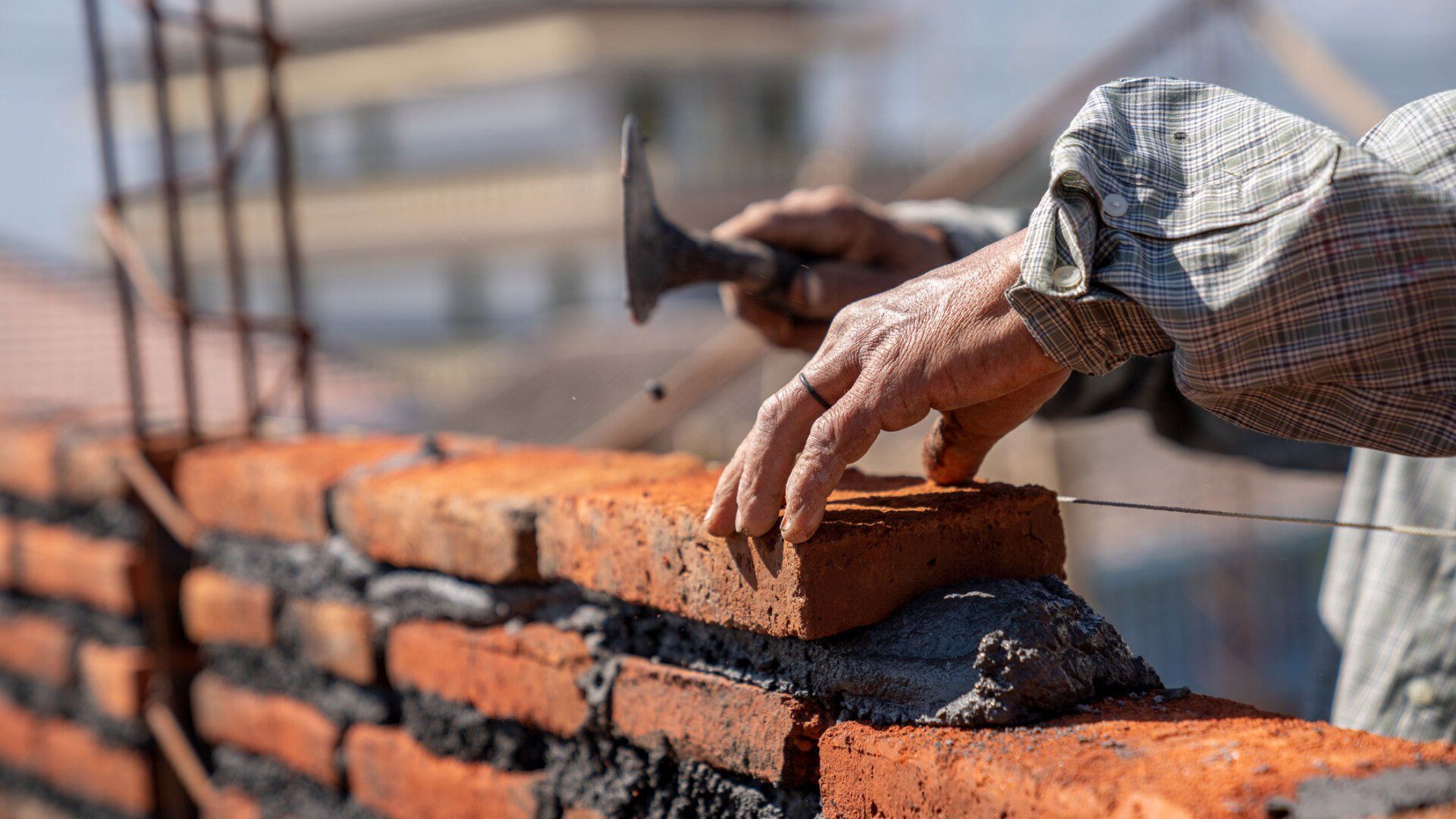 Man Placing Bricks — Portsmouth, VA — Smiley's Masonry Inc.