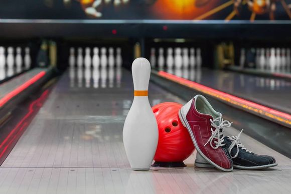 bowling pin, shoes, and ball