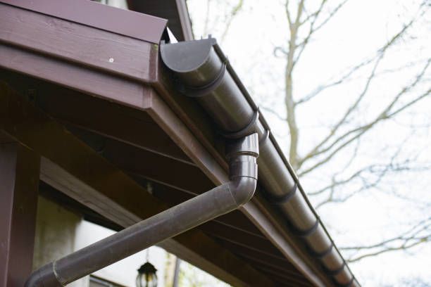 Brown gutter system on a brown house.