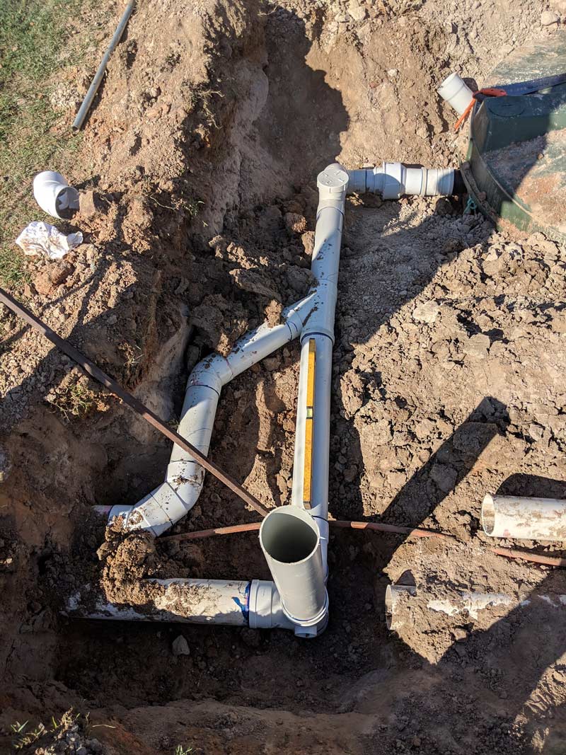 New Pipe Laying On The Ground — Antony Garrett Plumbing Services In Childers QLD