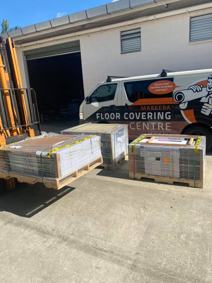 Fork Lift Moving Floor Tiles — Mareeba Floor Coverings Centre in Mareeba, QLD