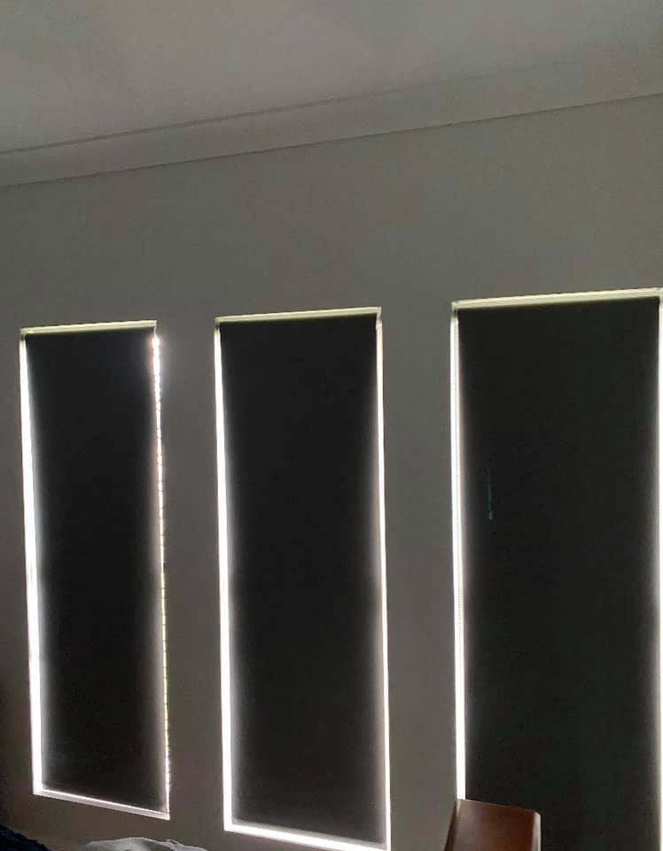 Grey Vinyl Flooring With Grey Curtains — Mareeba Floor Coverings Centre in Mareeba, QLD