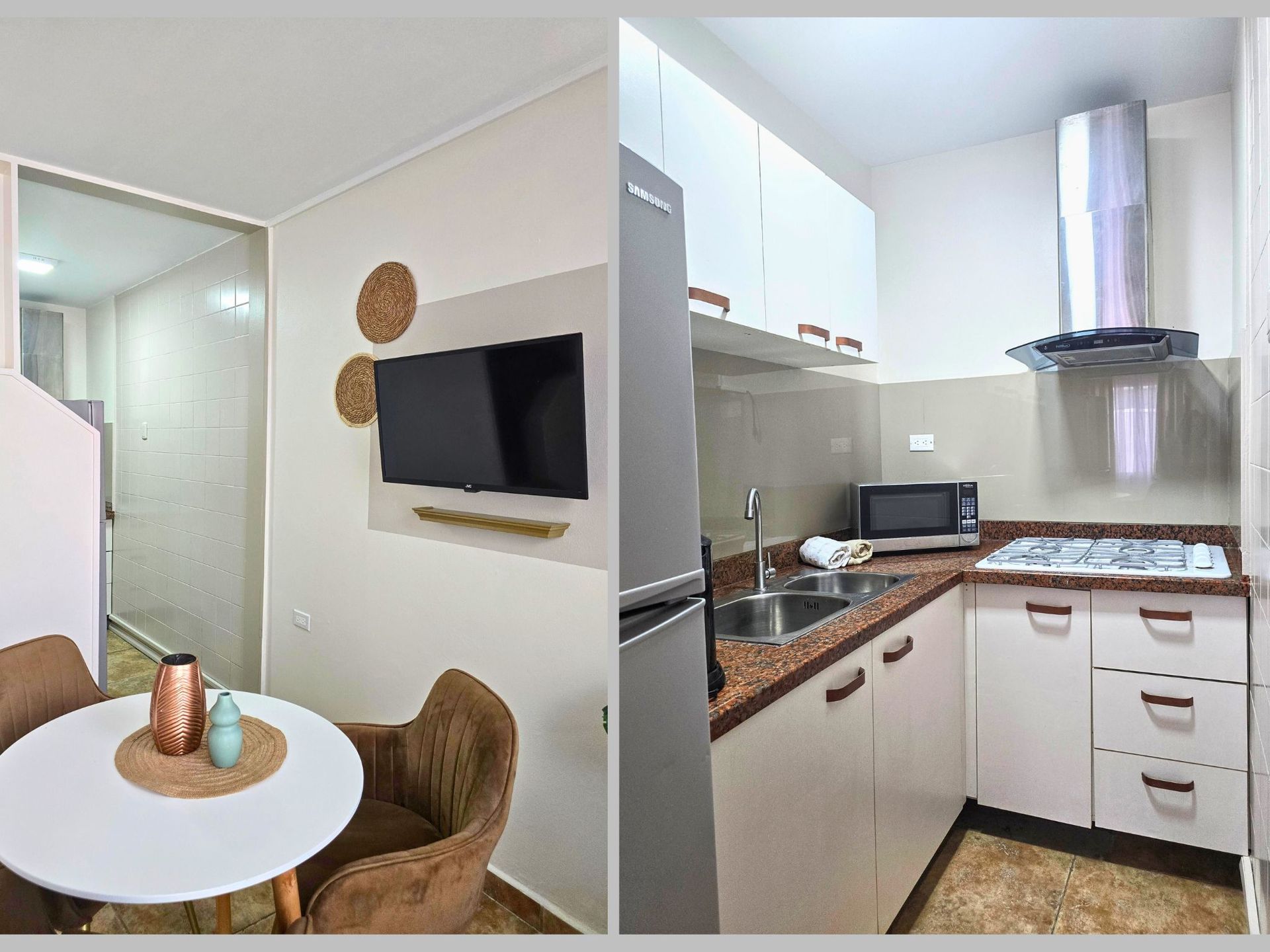 A living room with a couch a table and chairs