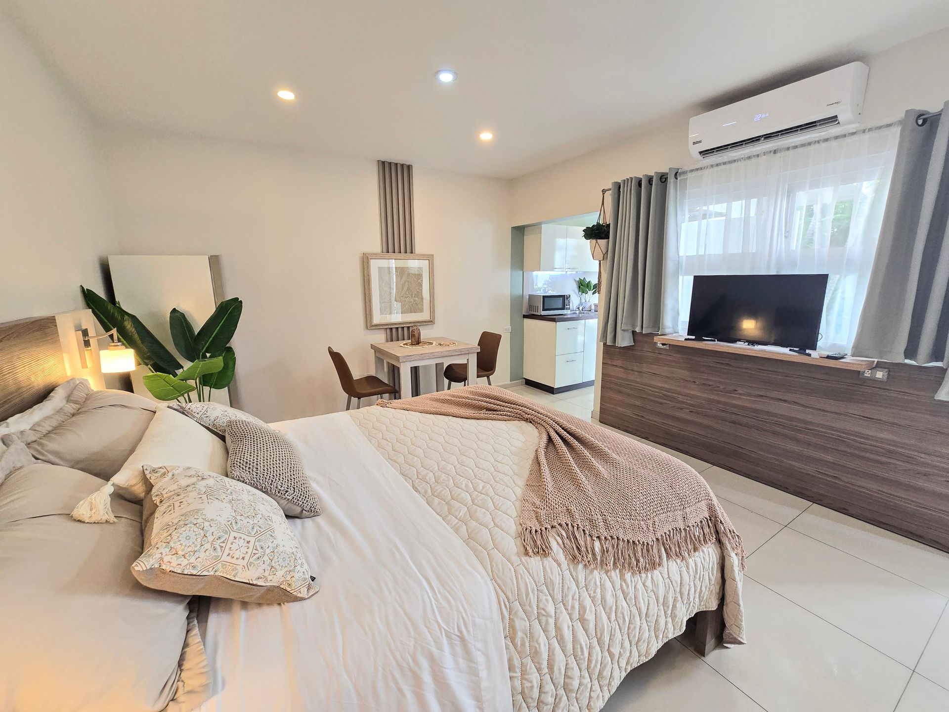 There is a large bed in the middle of the room.