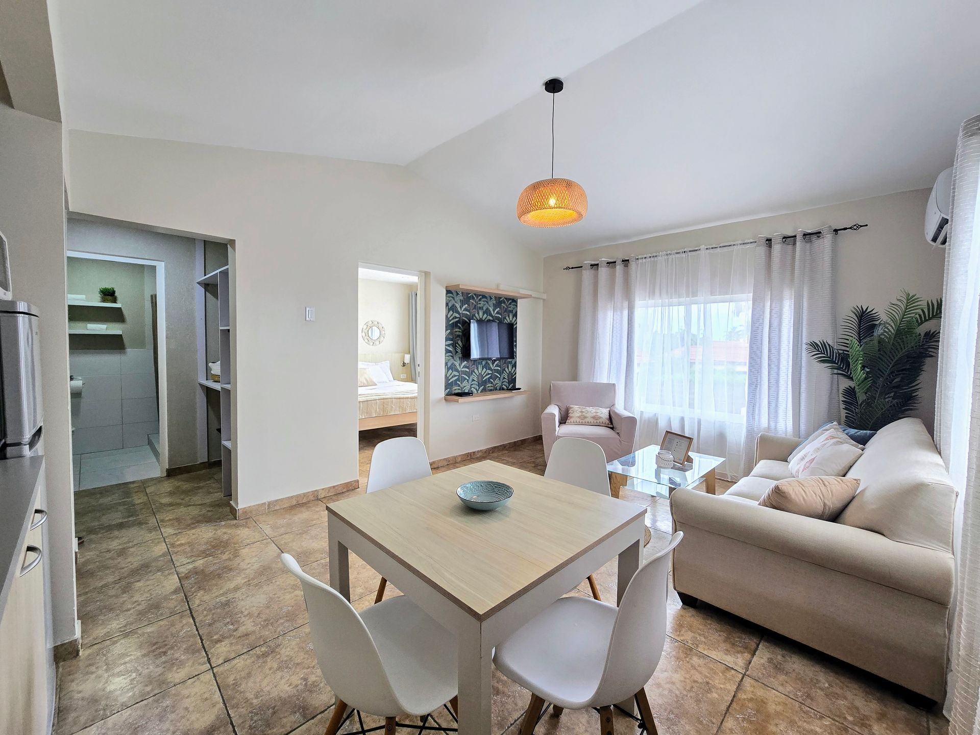 A large white house with a fence around it