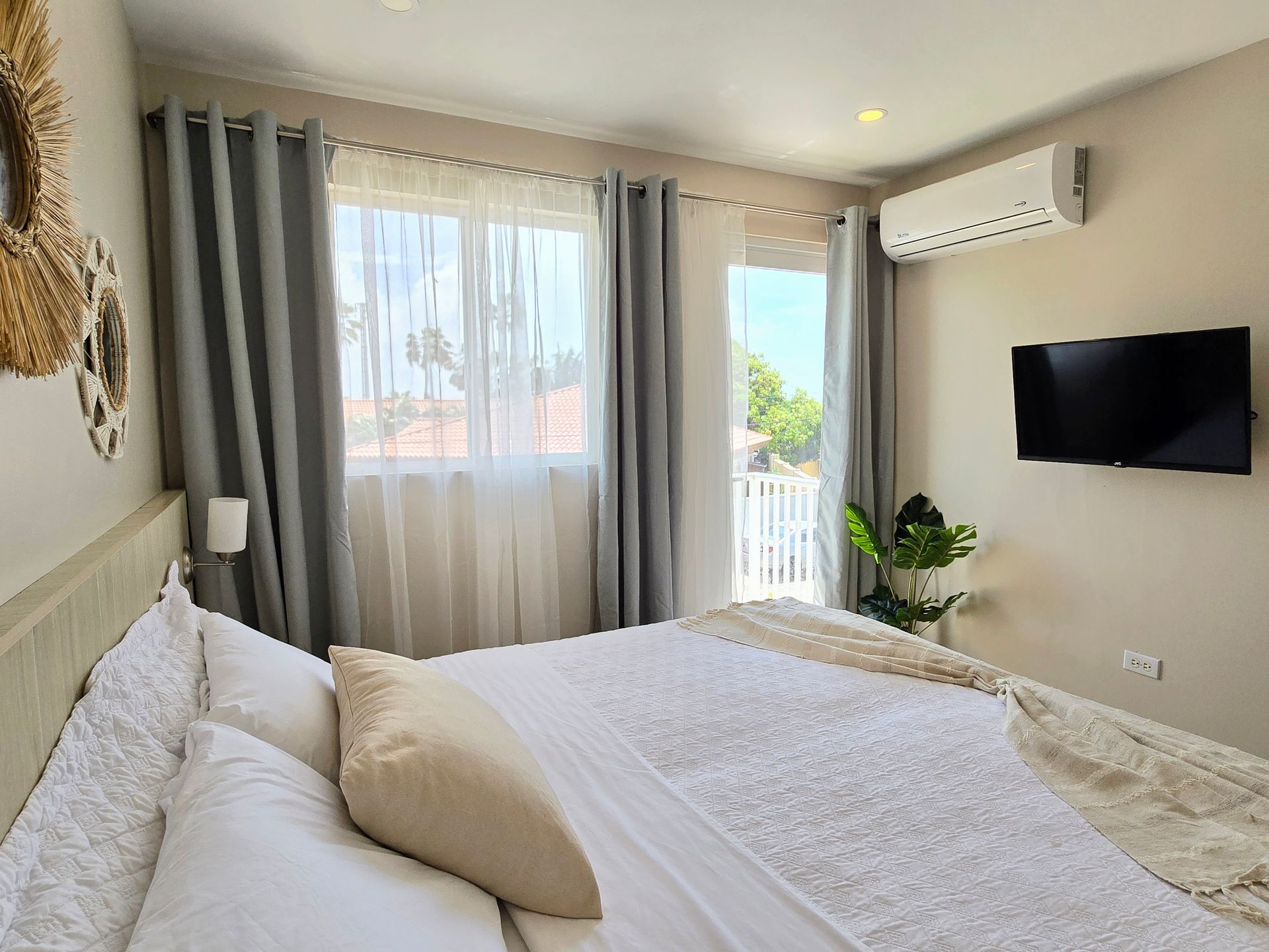 A bathroom with a sink and a large mirror