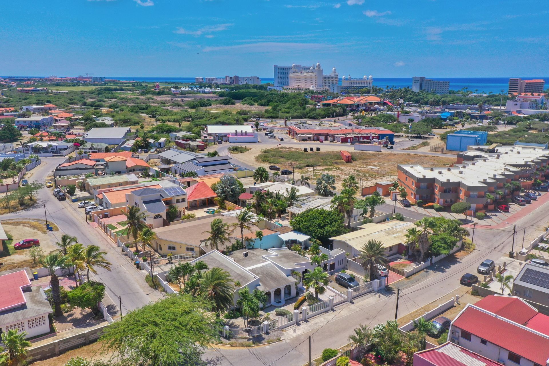 An aerial view of a city with a lot of buildings and trees.