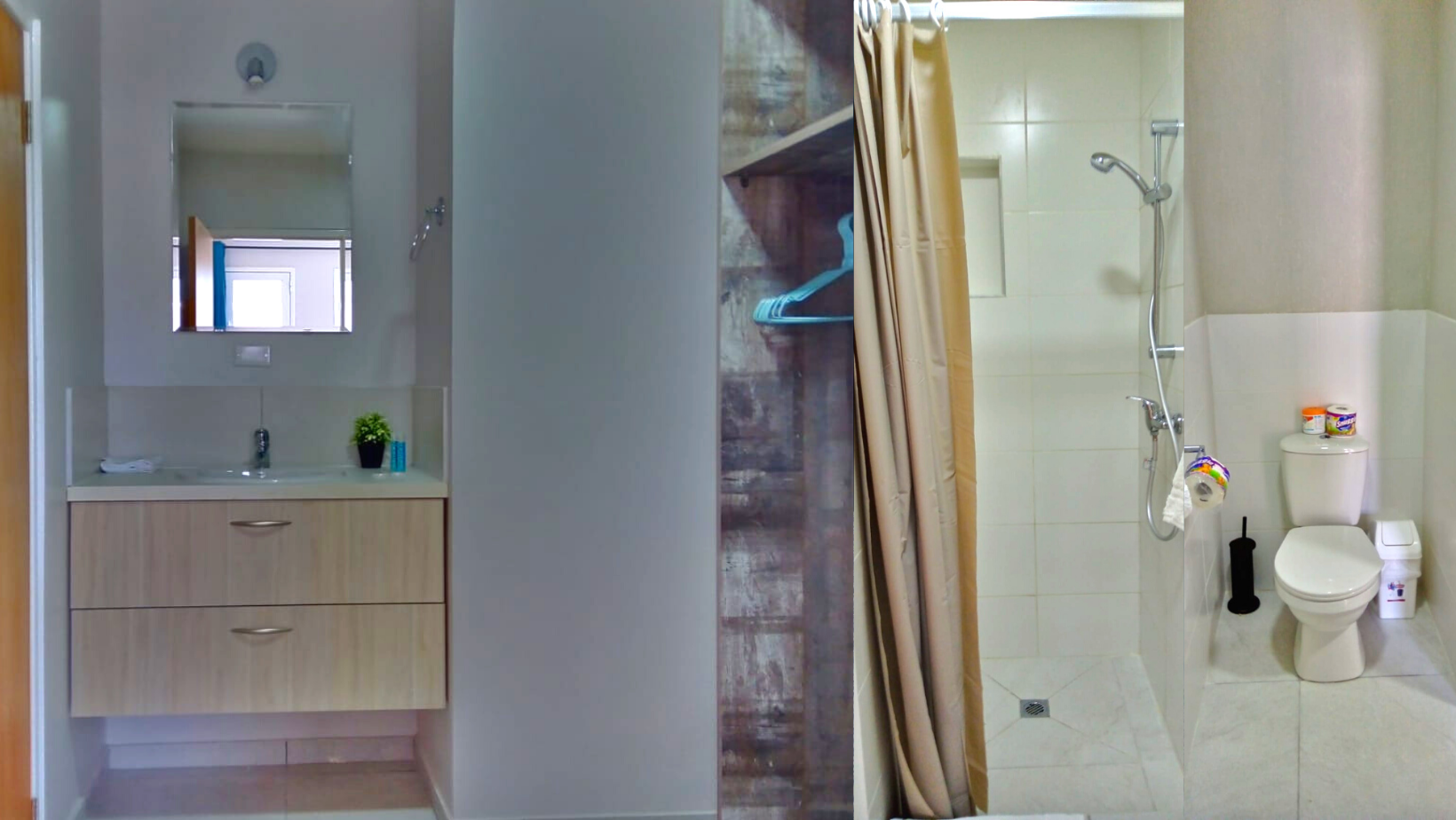 A bathroom with a sink , toilet and shower.