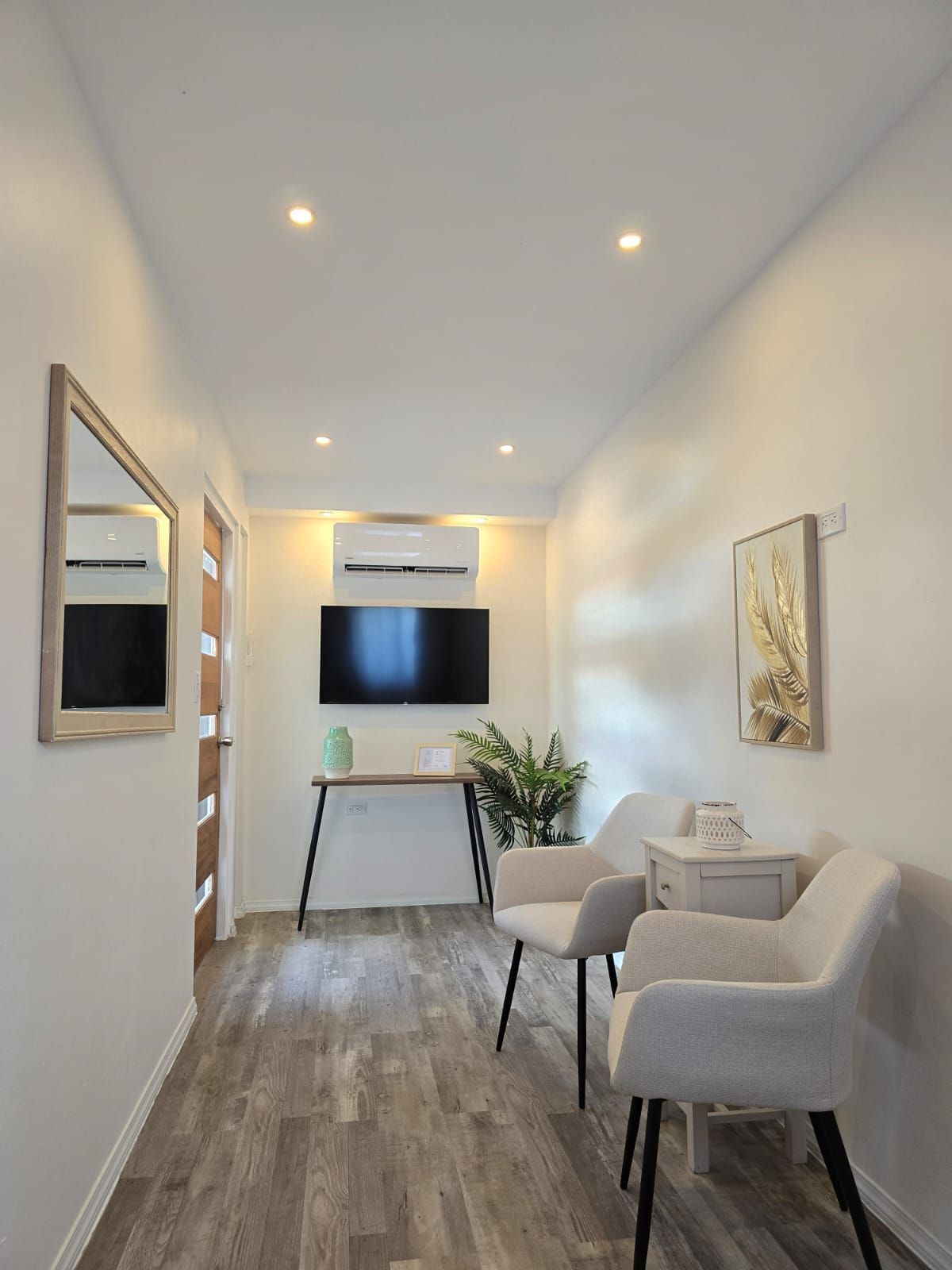 A kitchen with a refrigerator stove and microwave