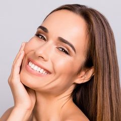 Botox — Woman Smiling After Botox Treatment in Merrillville, IN