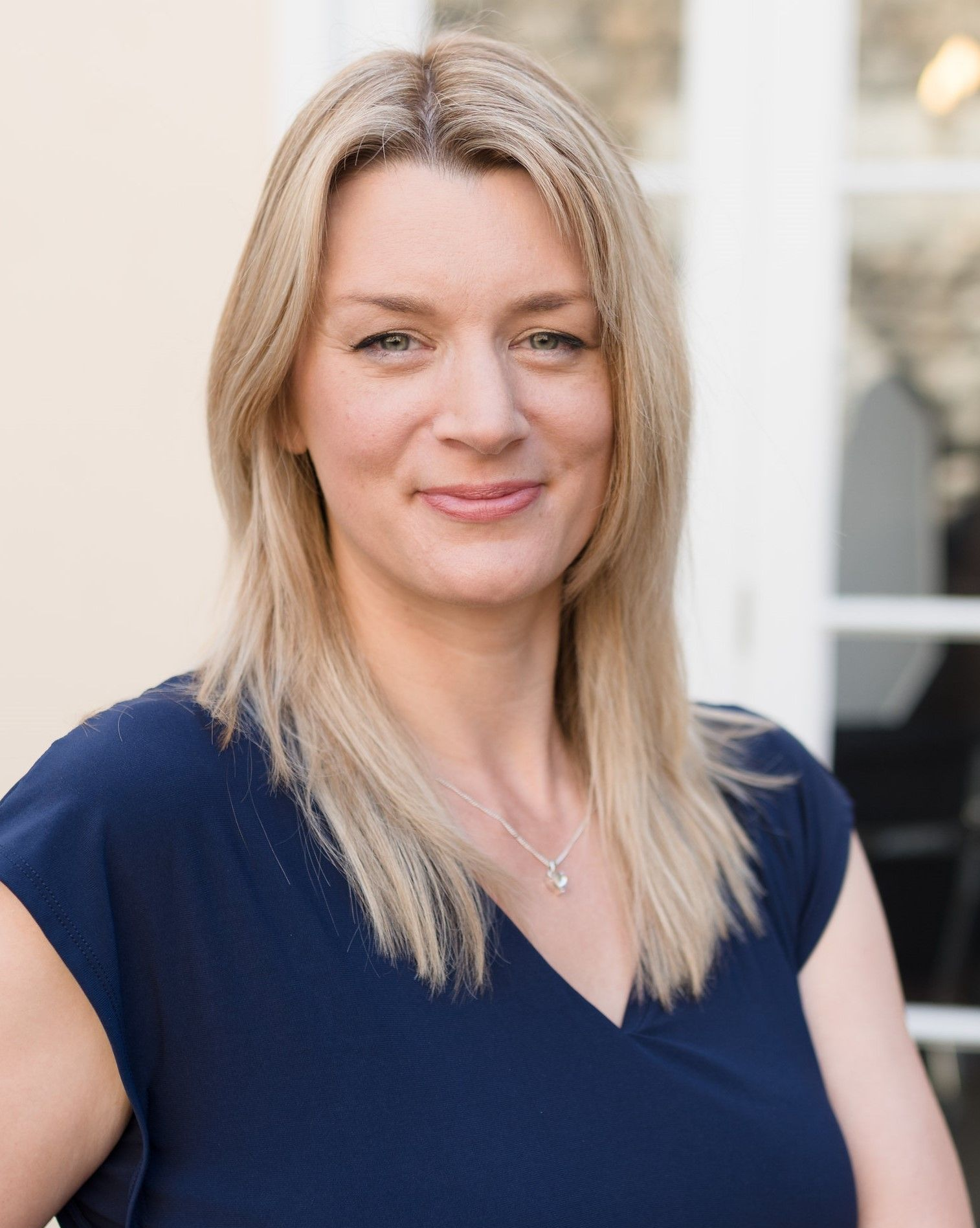 Kelly Owen profile photo looking directly at the camera