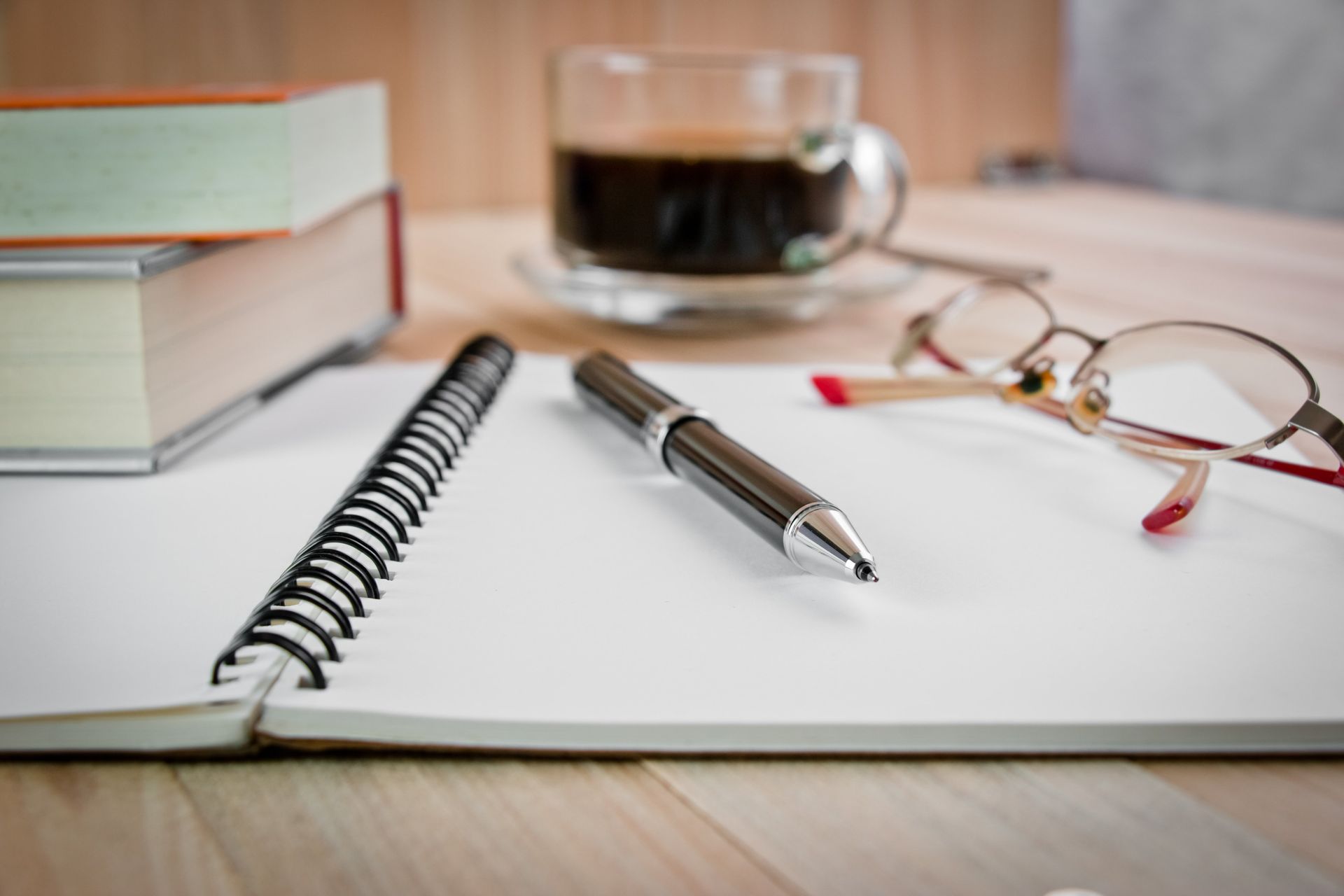 Proofreader ready to review text on a notebook 