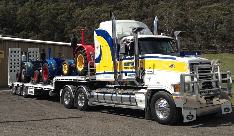truck hauling large equipment