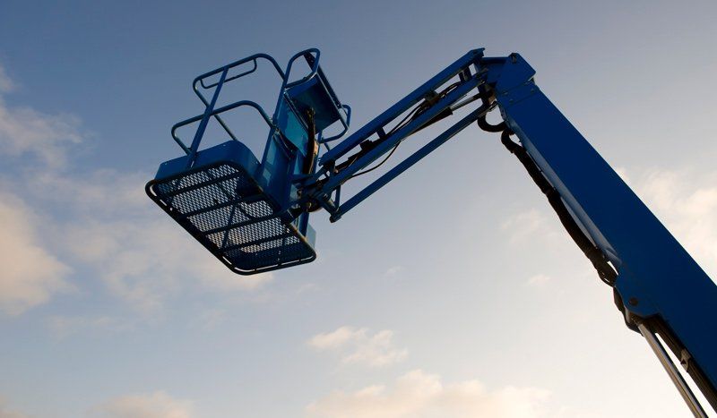 boom lift with sky background