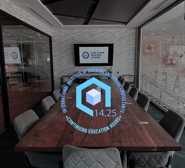 Conference room with a logo that includes 