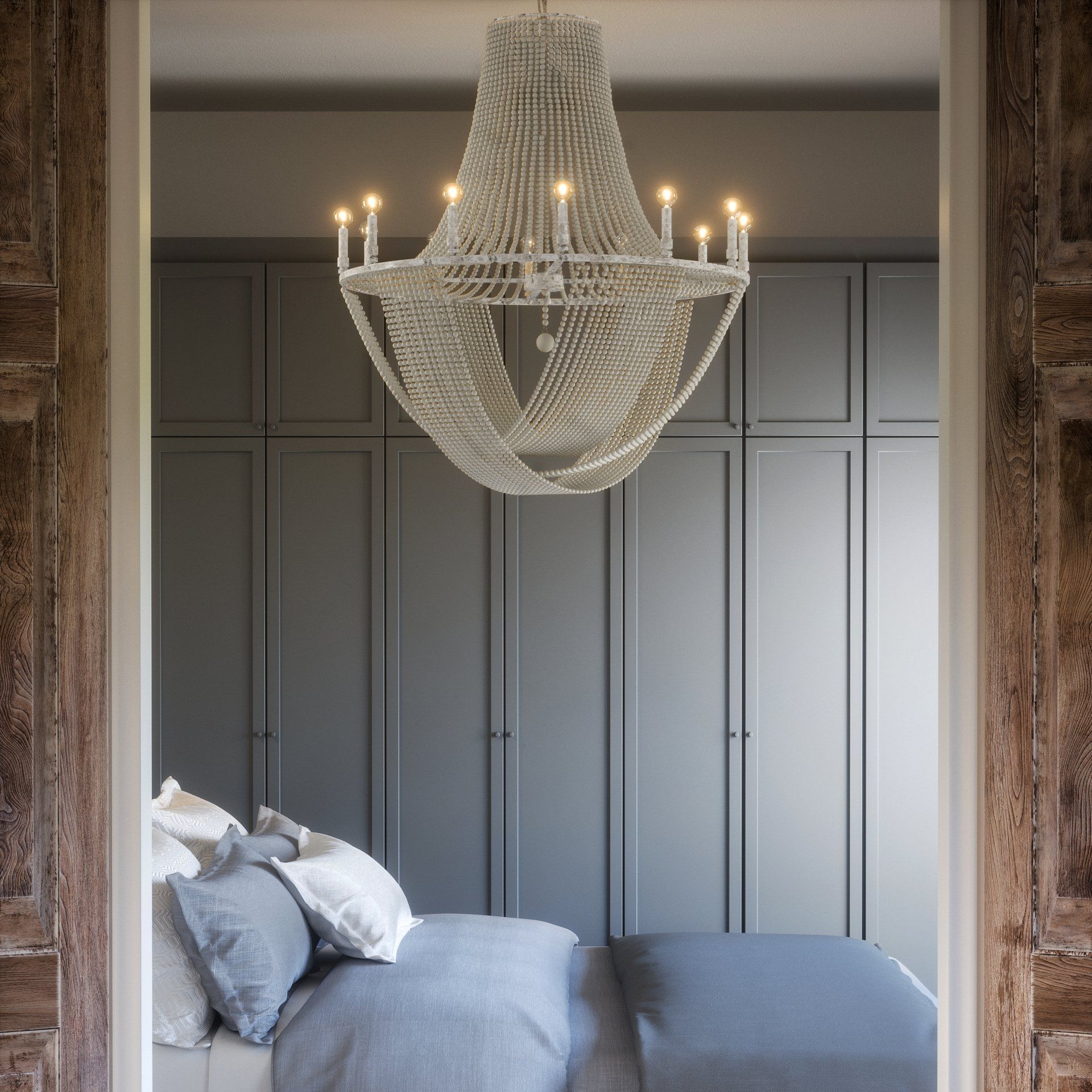 a bedroom with a large white chandelier hanging from the ceiling