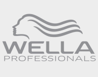 A wella professionals logo with a woman 's head and hair.
