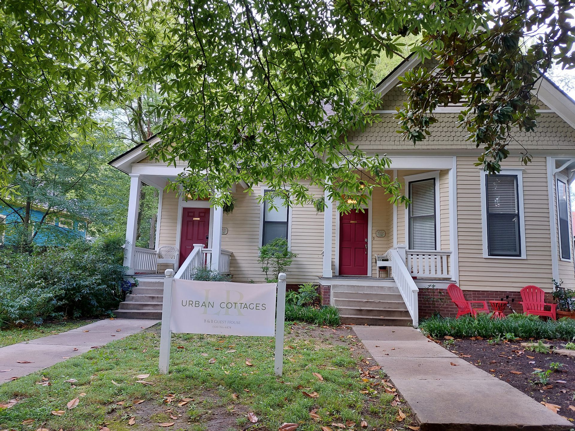 A small house with a sign in front of it that says steak farms