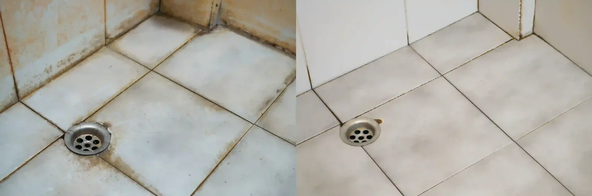 Close-up of beige tiled floor corner with two round drains and gray grout lines.
