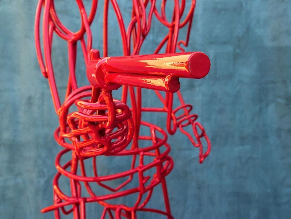 Toi Cowboy Standing Sculpture Front Close-Up