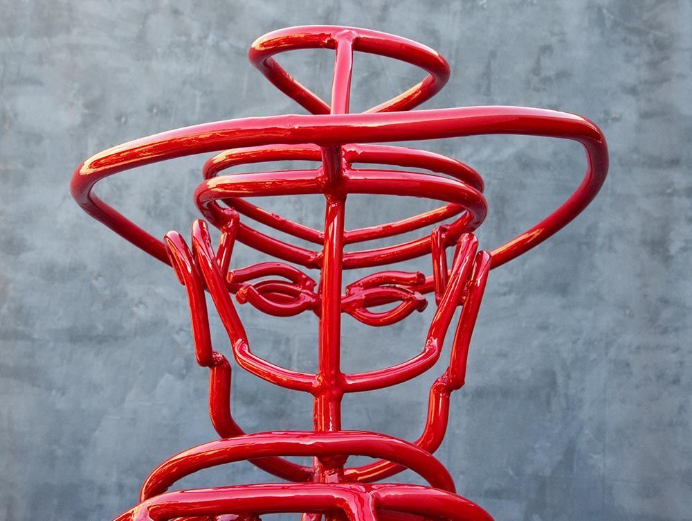 Toi Cowboy Standing Sculpture Back Close-Up