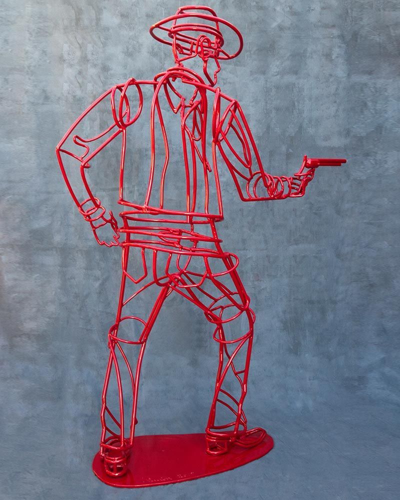 Toi Cowboy Standing Sculpture Back View