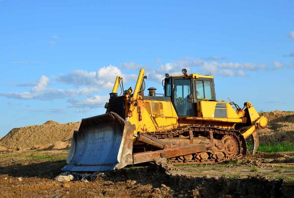 Yellow Bulldozer on a Construction Site — All Tree Solutions In Matcham, NSW