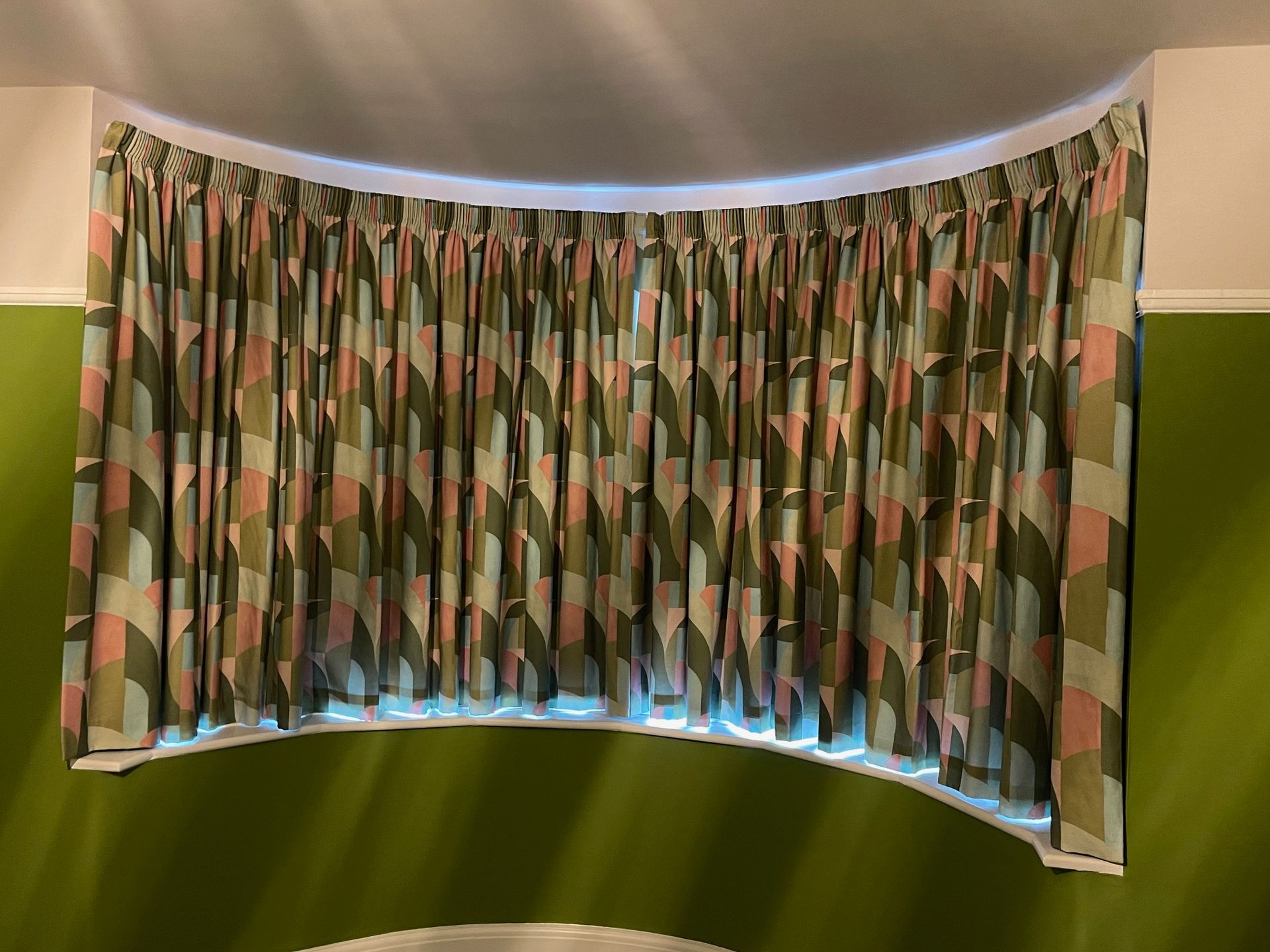 Curtains for a bay window plus tracking