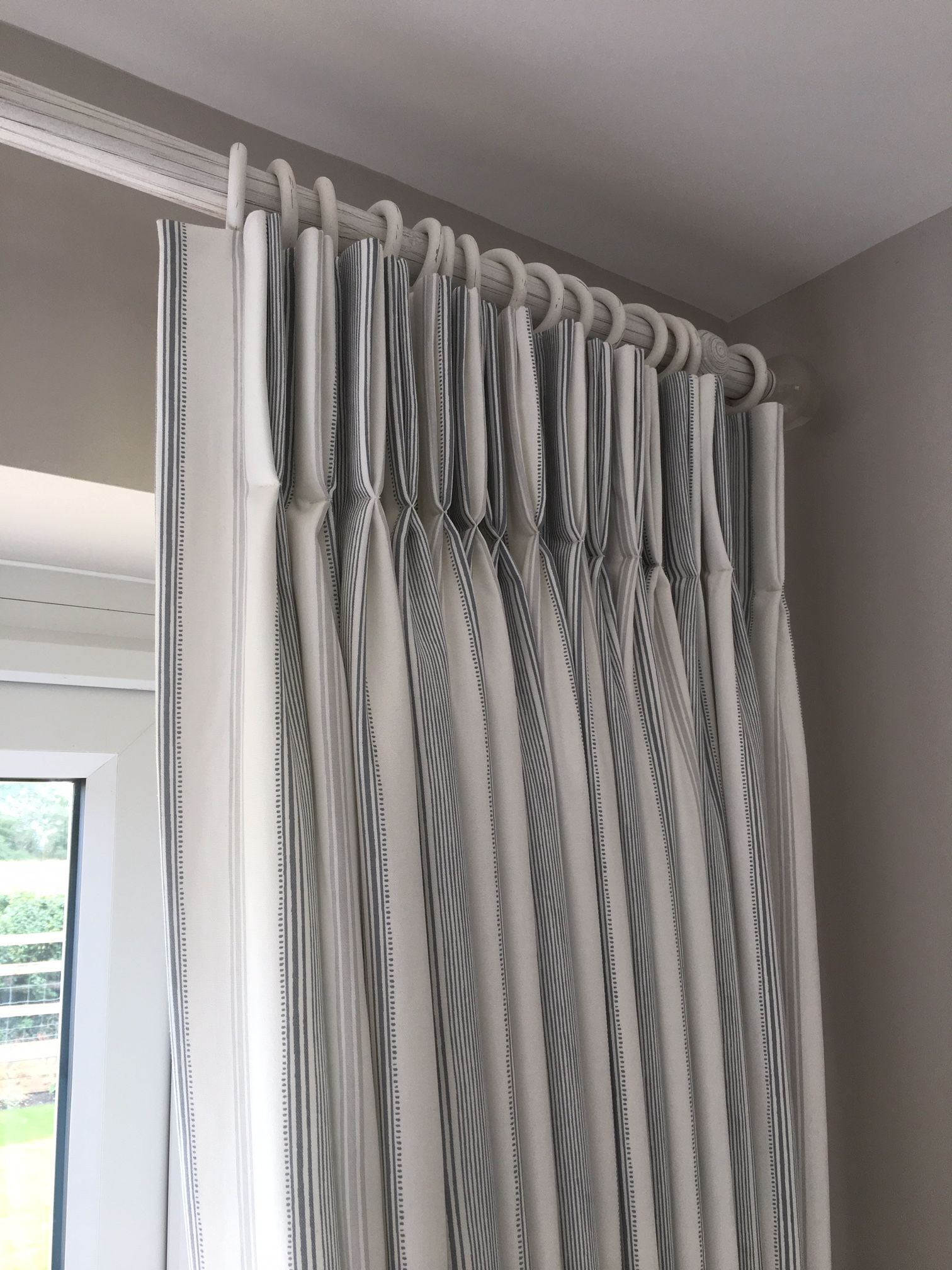 Pinch Pleat Curtains fitted on a curtain pole