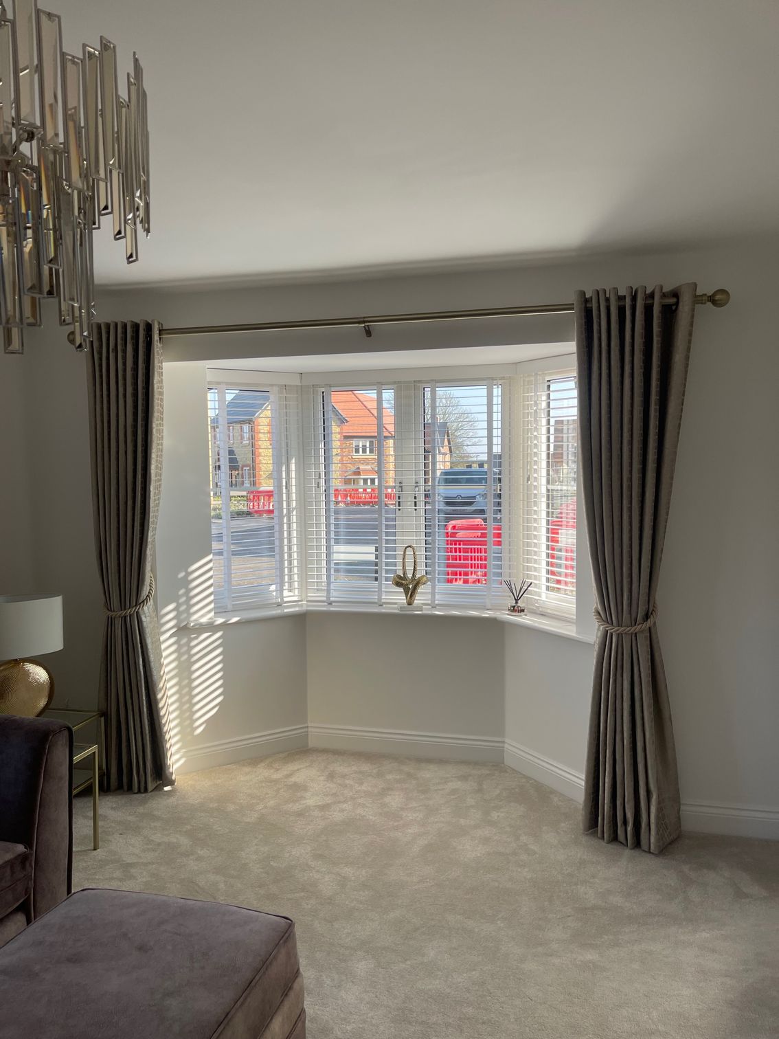 Custom made full length curtains in a bay window