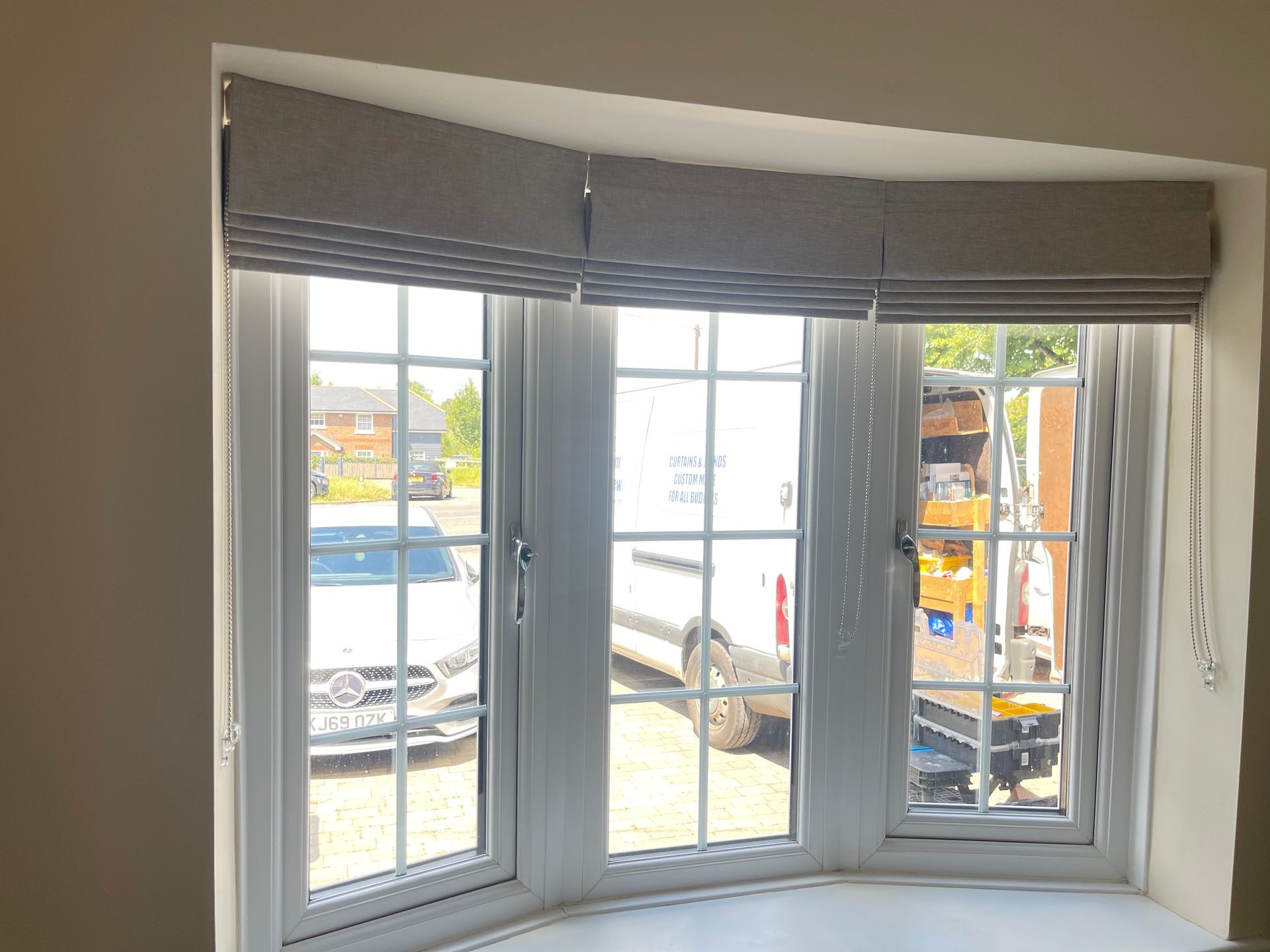 Roman Blinds for a bay window, custom made & fitted