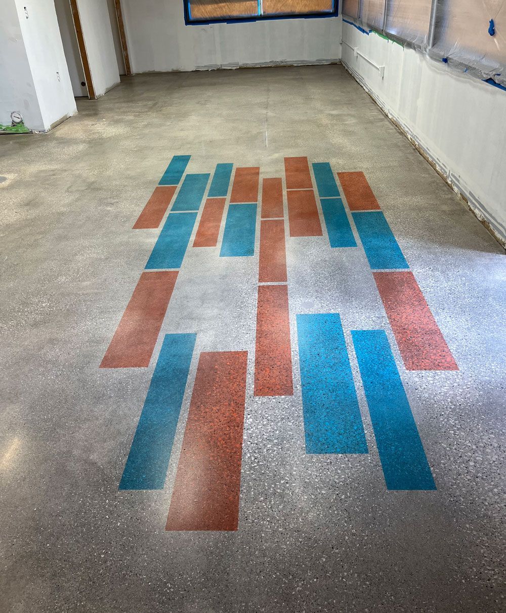 A room with a pattern of red and blue squares on the floor