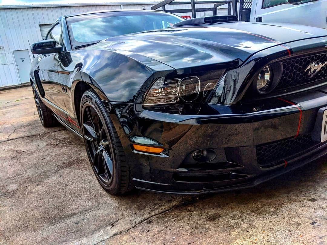 Black Ford Mustang In Parking Area | Full-Service Auto Repair