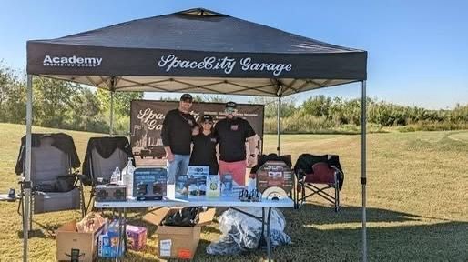 Space City Garage Booth At Outdoor Event | Full-Service Auto Repair
