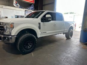 White Ford Truck Inside The Garage | Full-Service Auto Repair