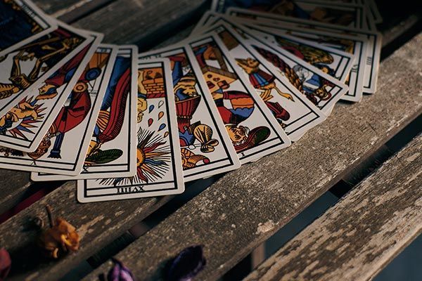 Tarot Cards on Wooden Table — New Orleans, LA — White Rabbit Tarot LLC