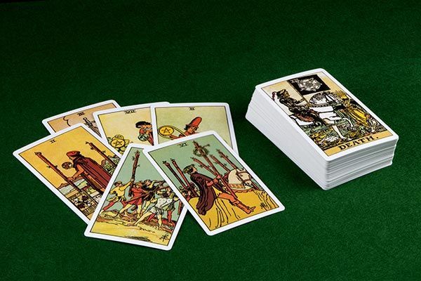 Scattered Tarot Cards — New Orleans, LA — White Rabbit Tarot LLC