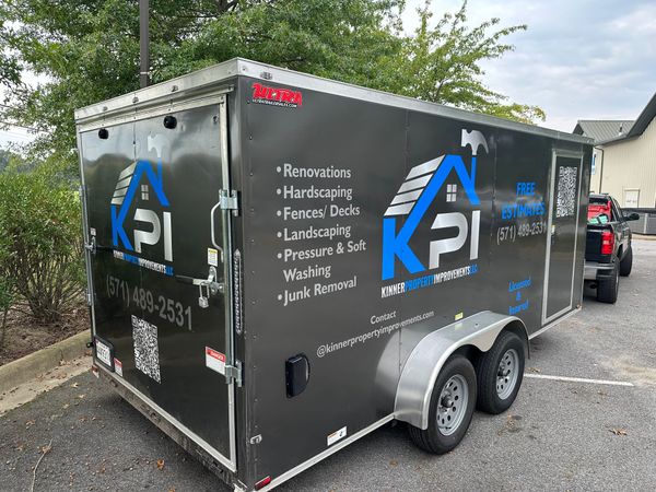 Dark gray trailer with blue 