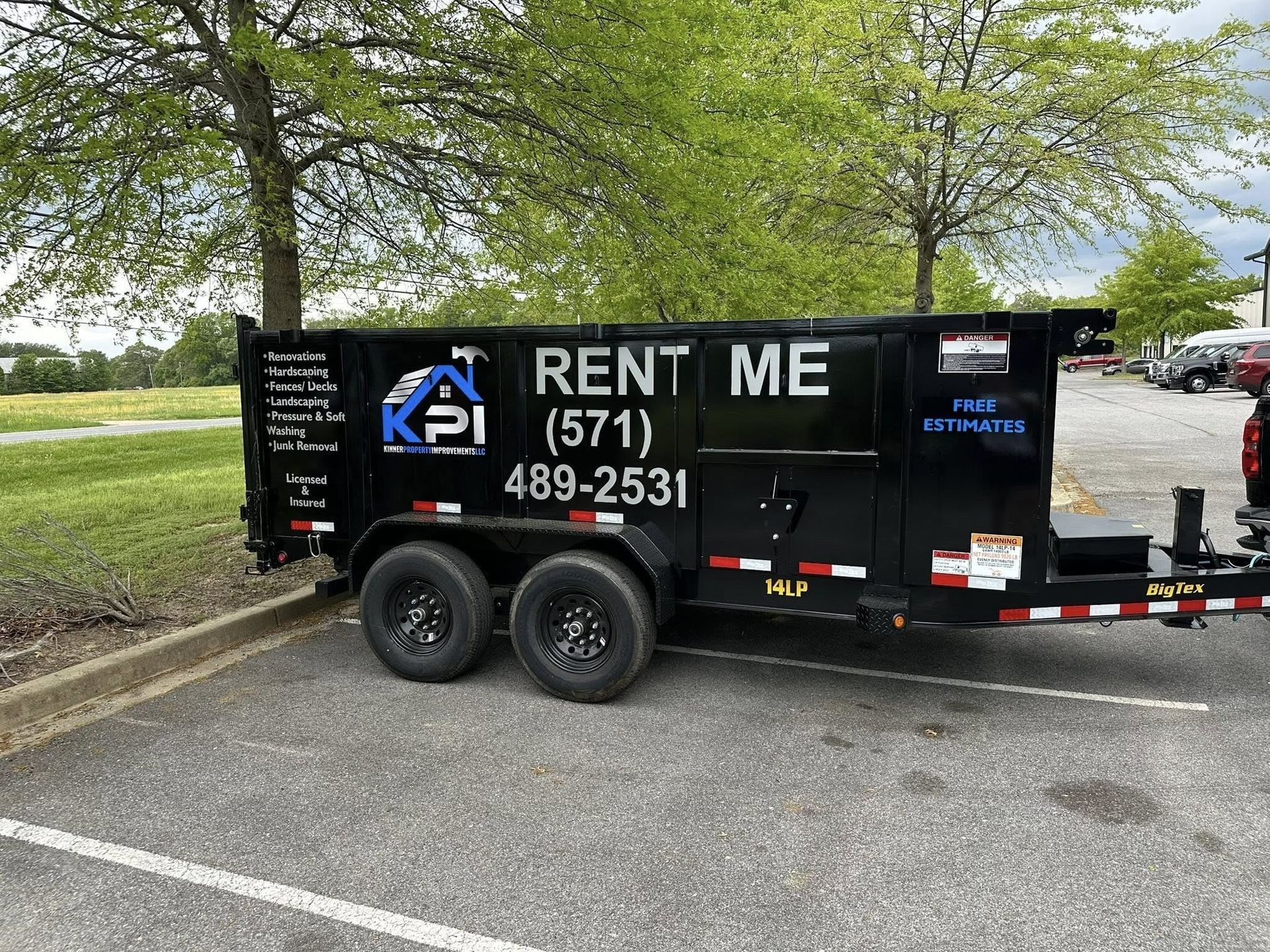 Black dumpster trailer with 