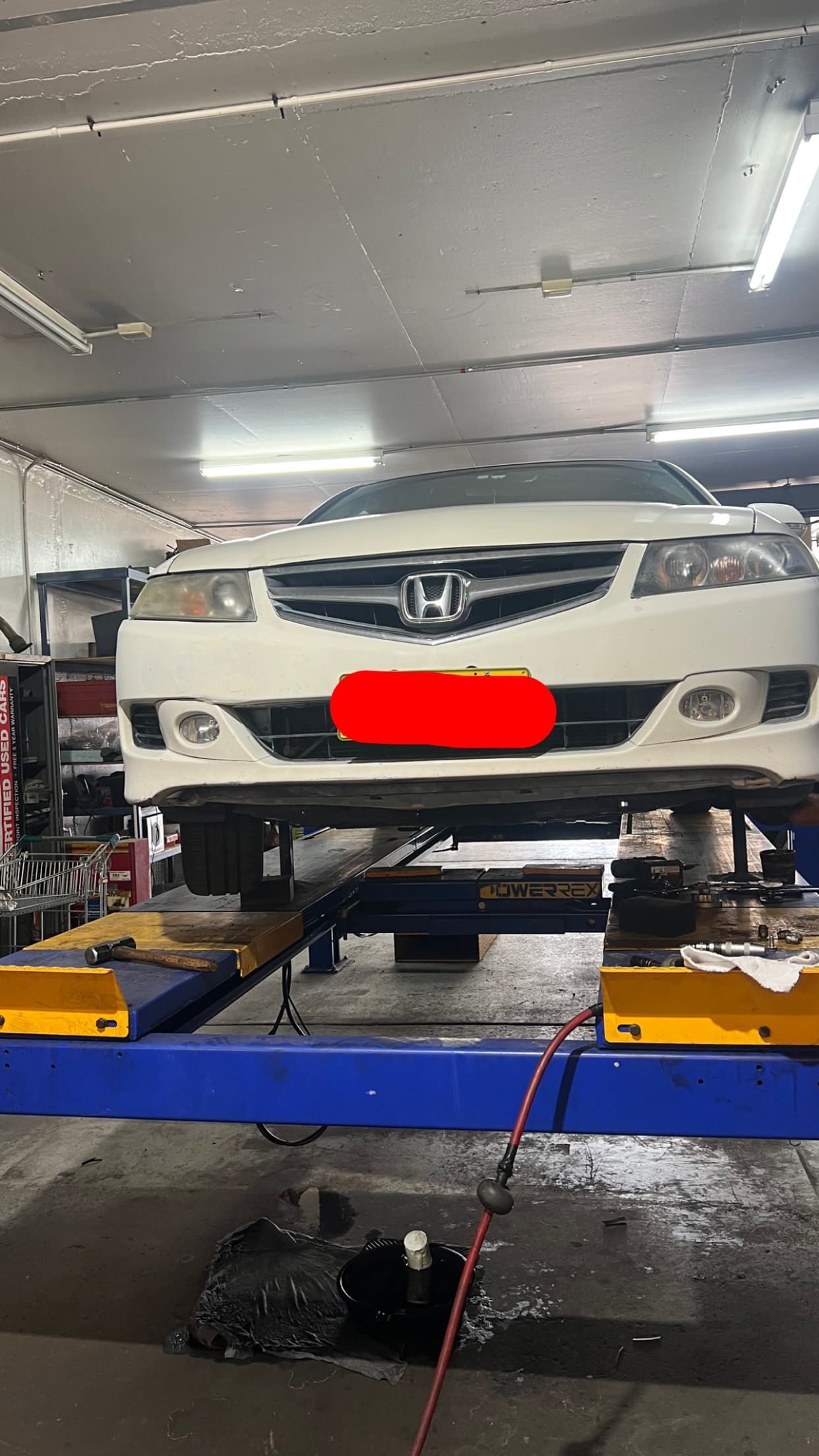 Branded Car on The Lifter for Repair - Mechanic in Belconnen, ACT