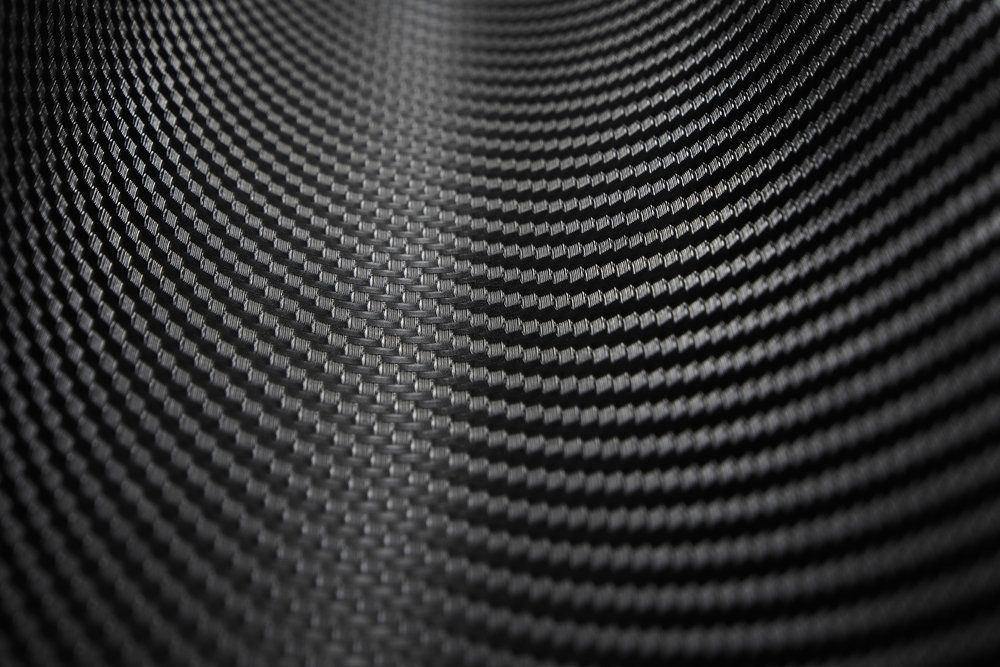 Eine Nahaufnahme eines schwarz-weißen kreisförmigen Musters.