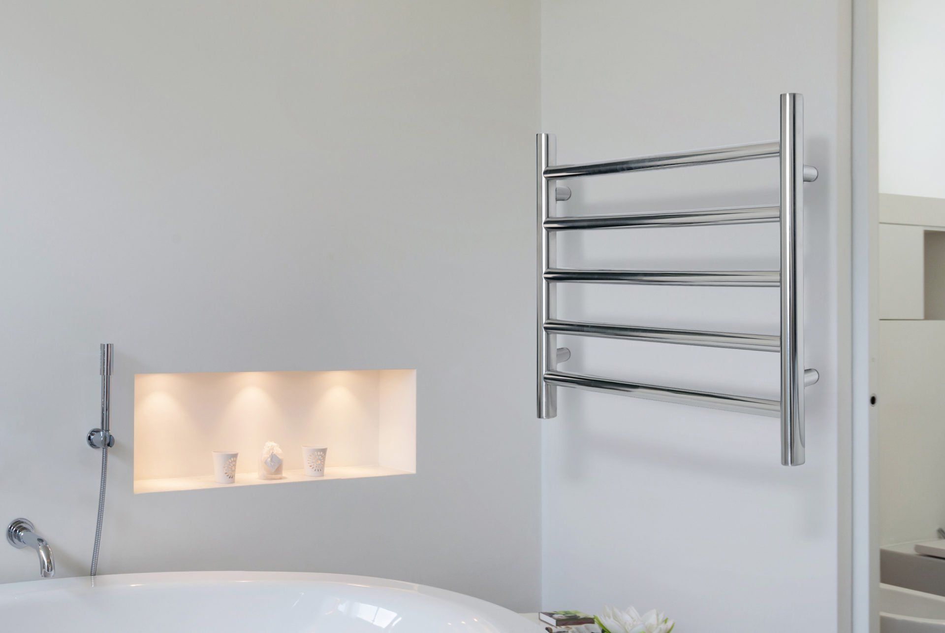 A Bathroom with A Bathtub and A Towel Rack on The Wall — Canberra Kitchen & Bathroom in Fyshwick, ACT