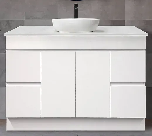 A Bathroom Vanity with A Sink on Top of It — Canberra Kitchen & Bathroom in Fyshwick, ACT