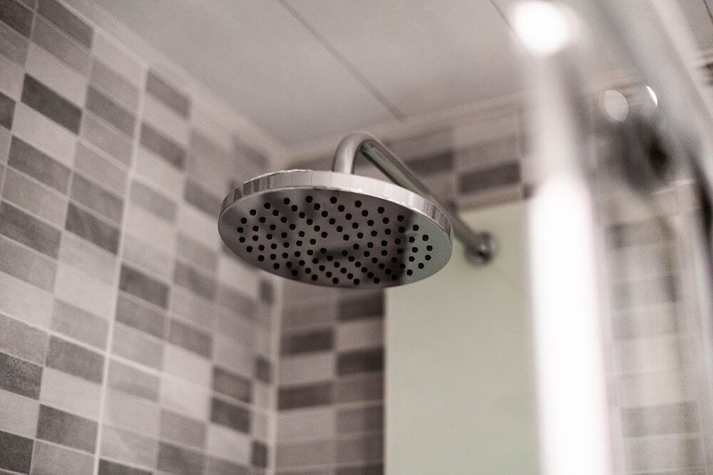 A Close up Of a Shower Head in A Bathroom — Canberra Kitchen & Bathroom in Fyshwick, ACT