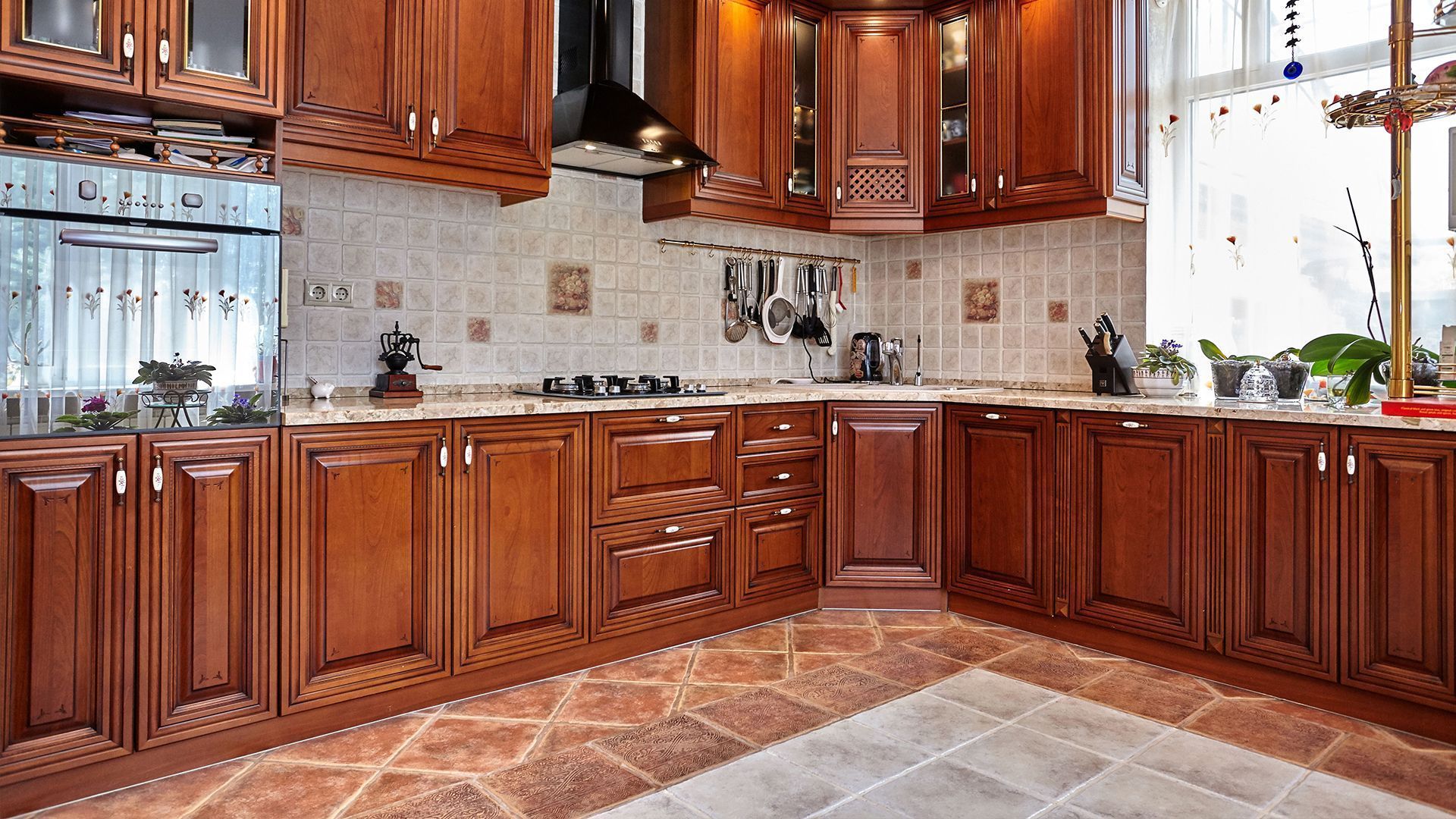Bathroom with black vanity, white toilet, and red towel.