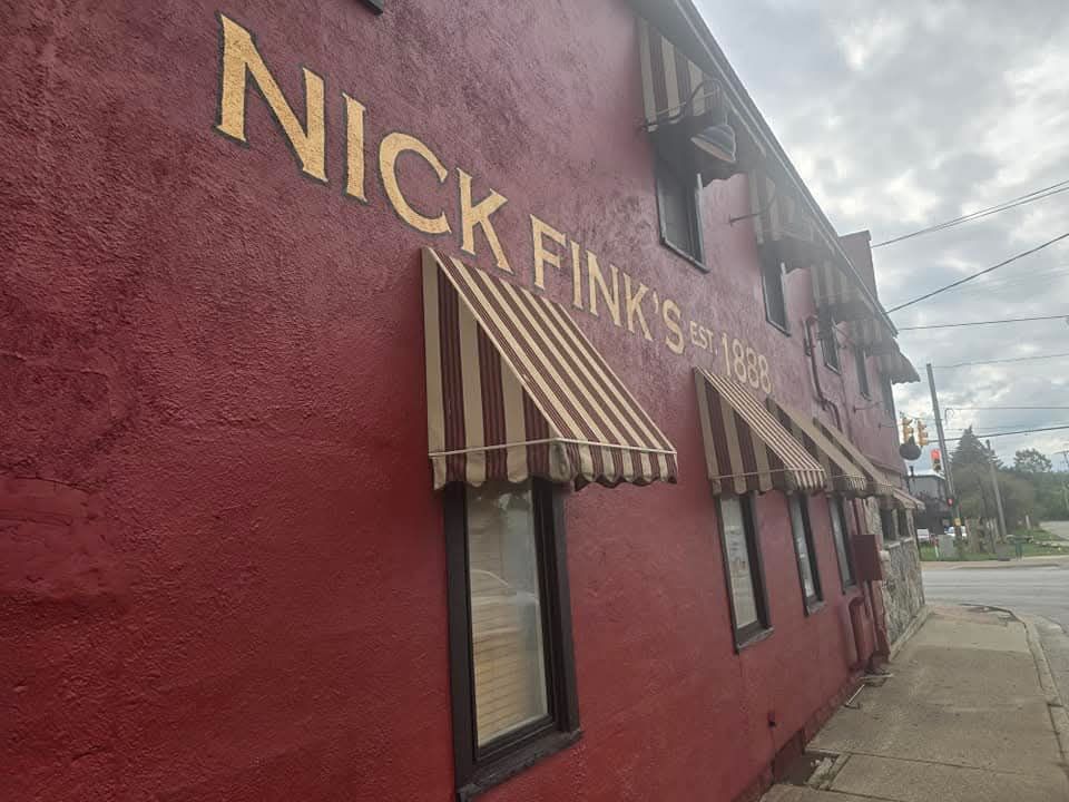 Red building with gold lettering 