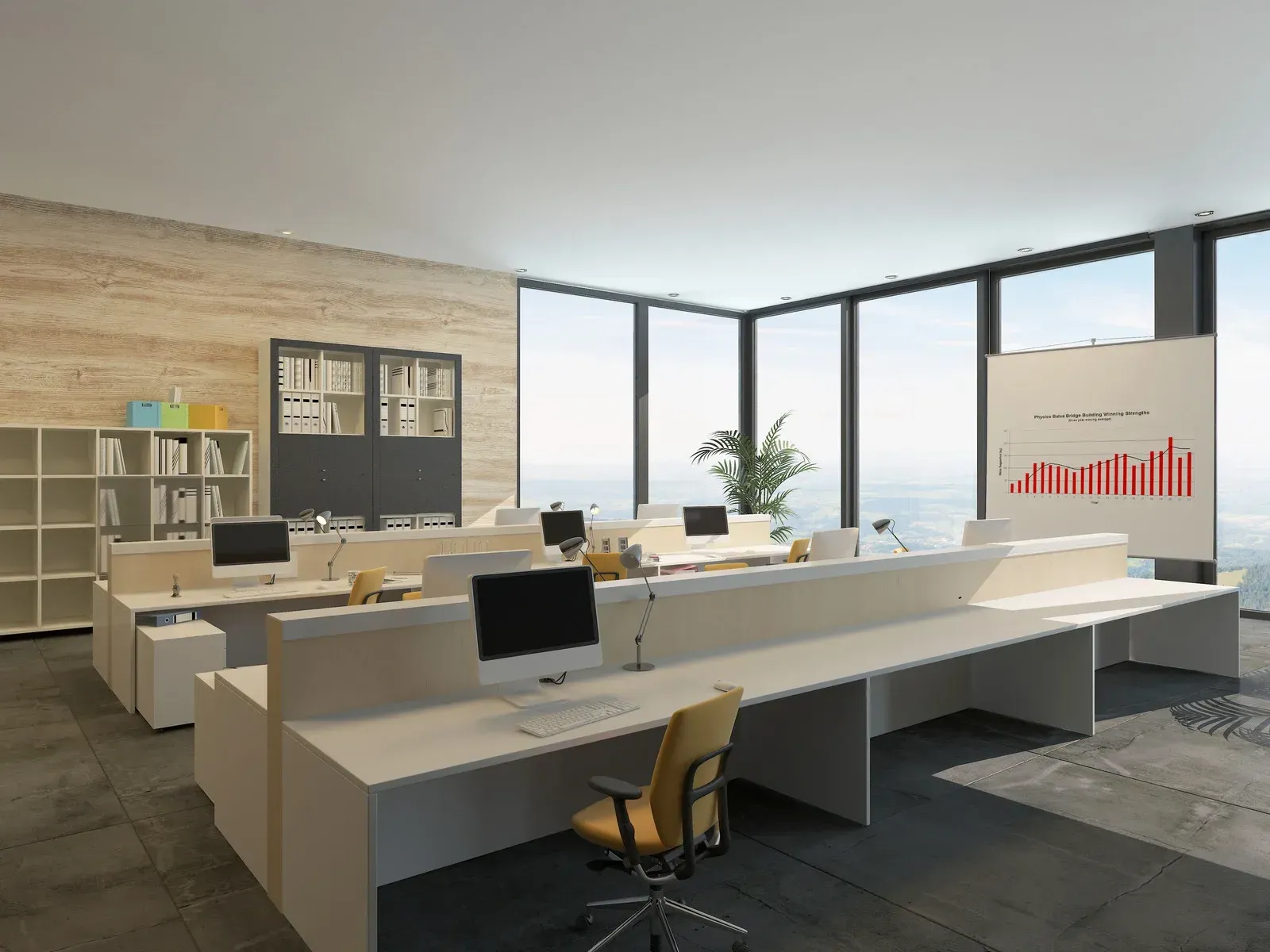An office with a lot of windows and desks with computers.